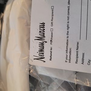 Mountain cleats off white in color purple and white